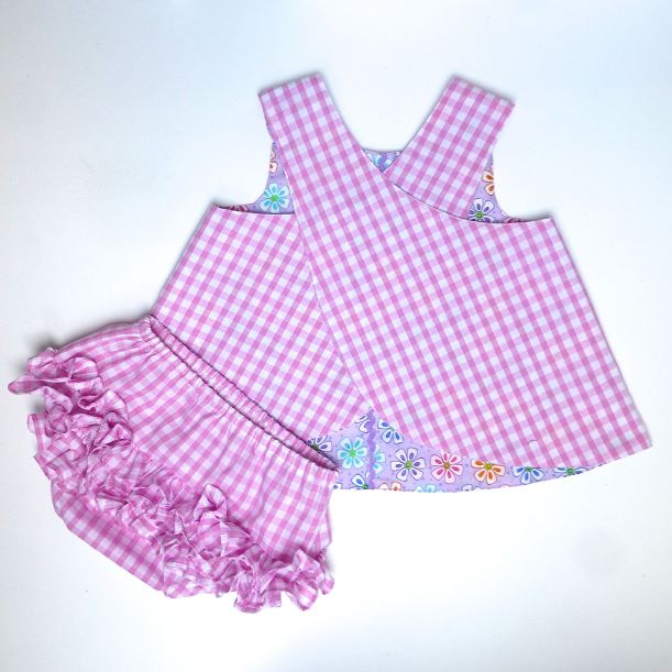 baby wrap over dress and frilly pants back