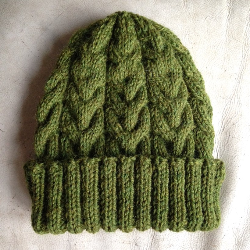 green bobble hat